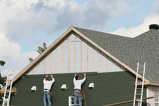 Professional Vinyl Siding technician working in Boonville, NC